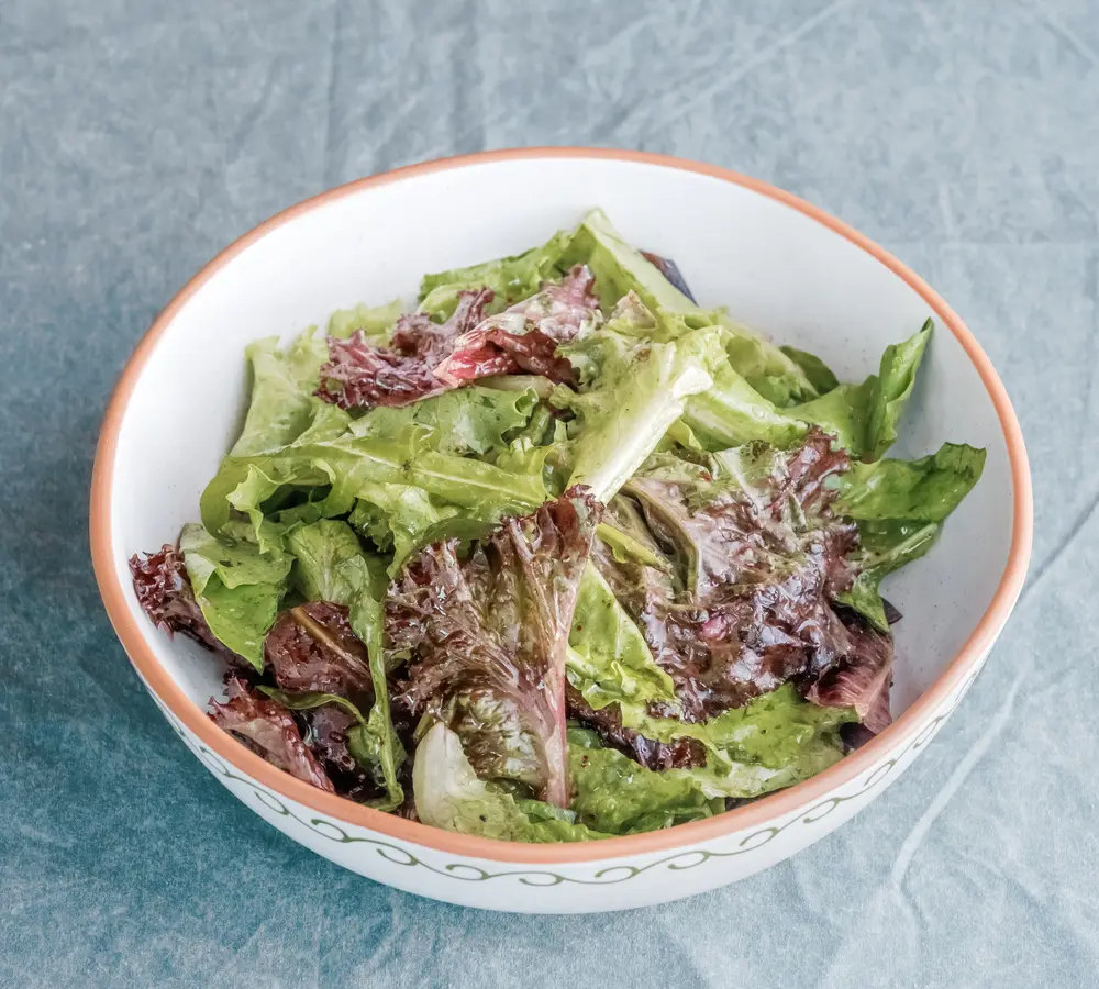 A fresh green salad with colorful vegetables